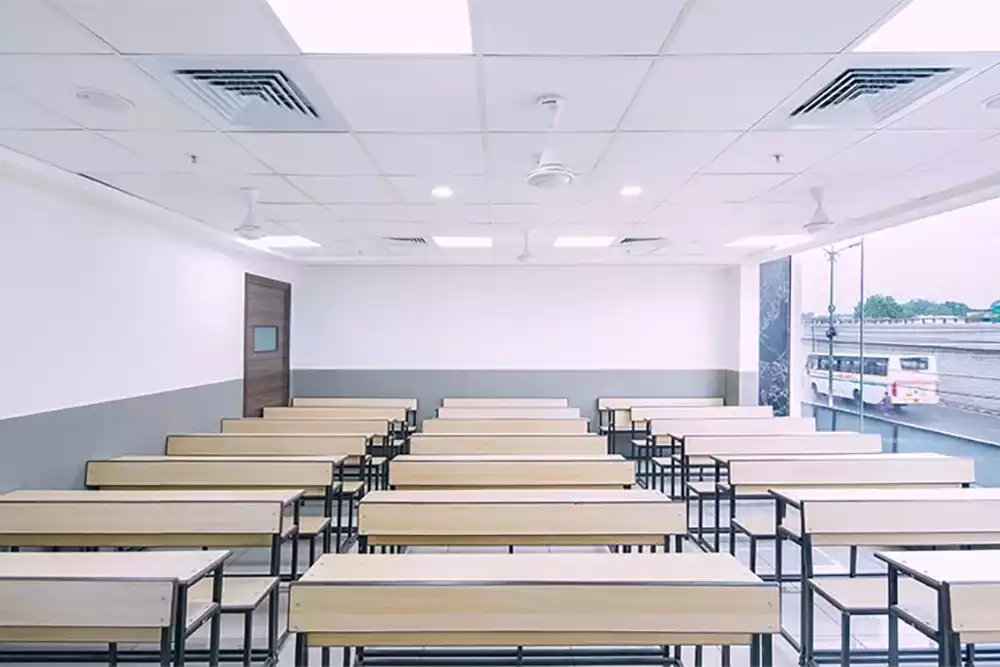 Grid ceiling used in classroom with big glass window of Aakash Institute | Everest Industries