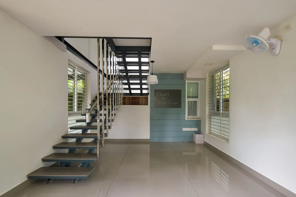 Interior of Chalakudy Villa built with prefab walls and white flooring | Everest Industries